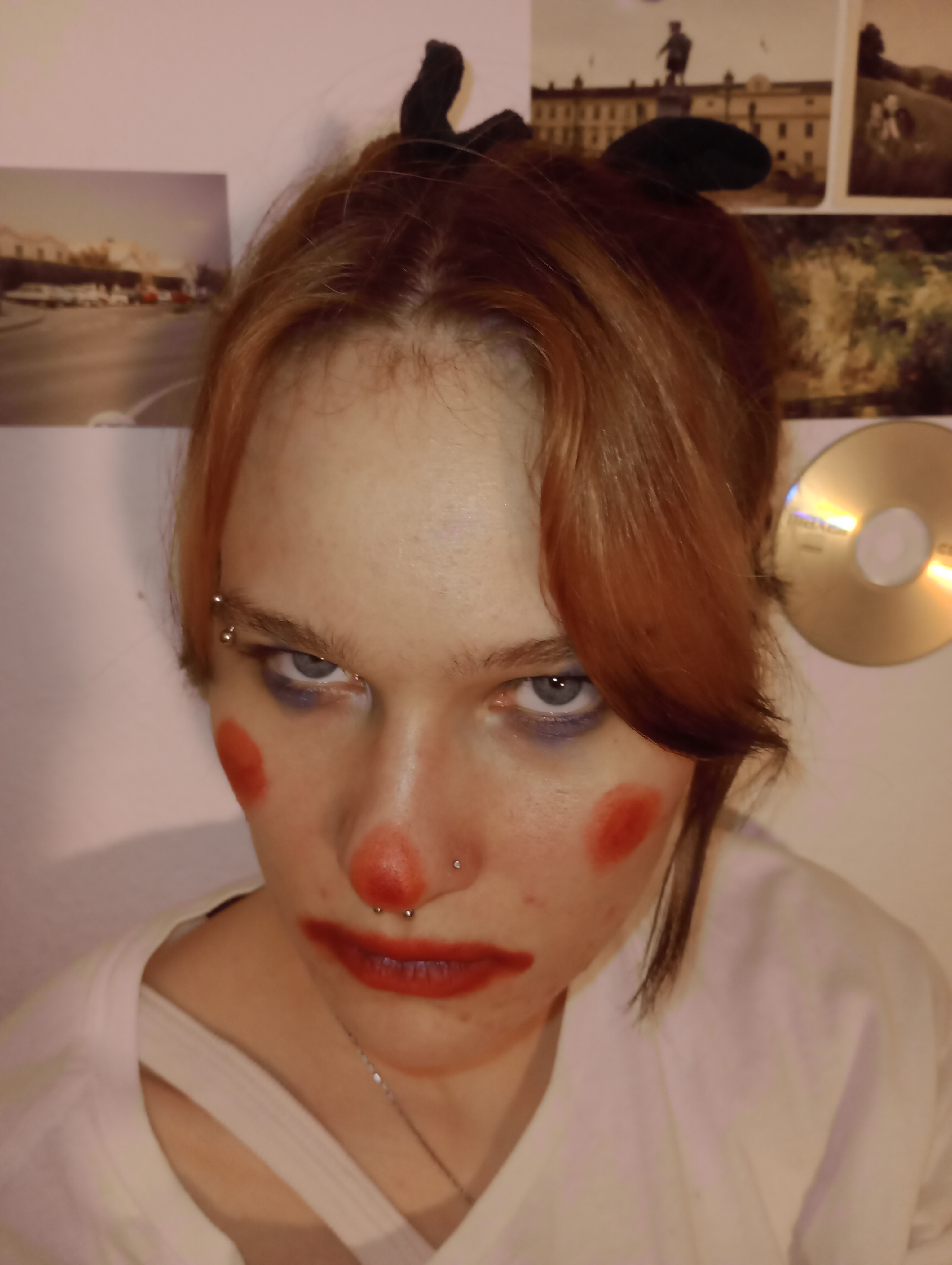 beautiful woman in clown makeup